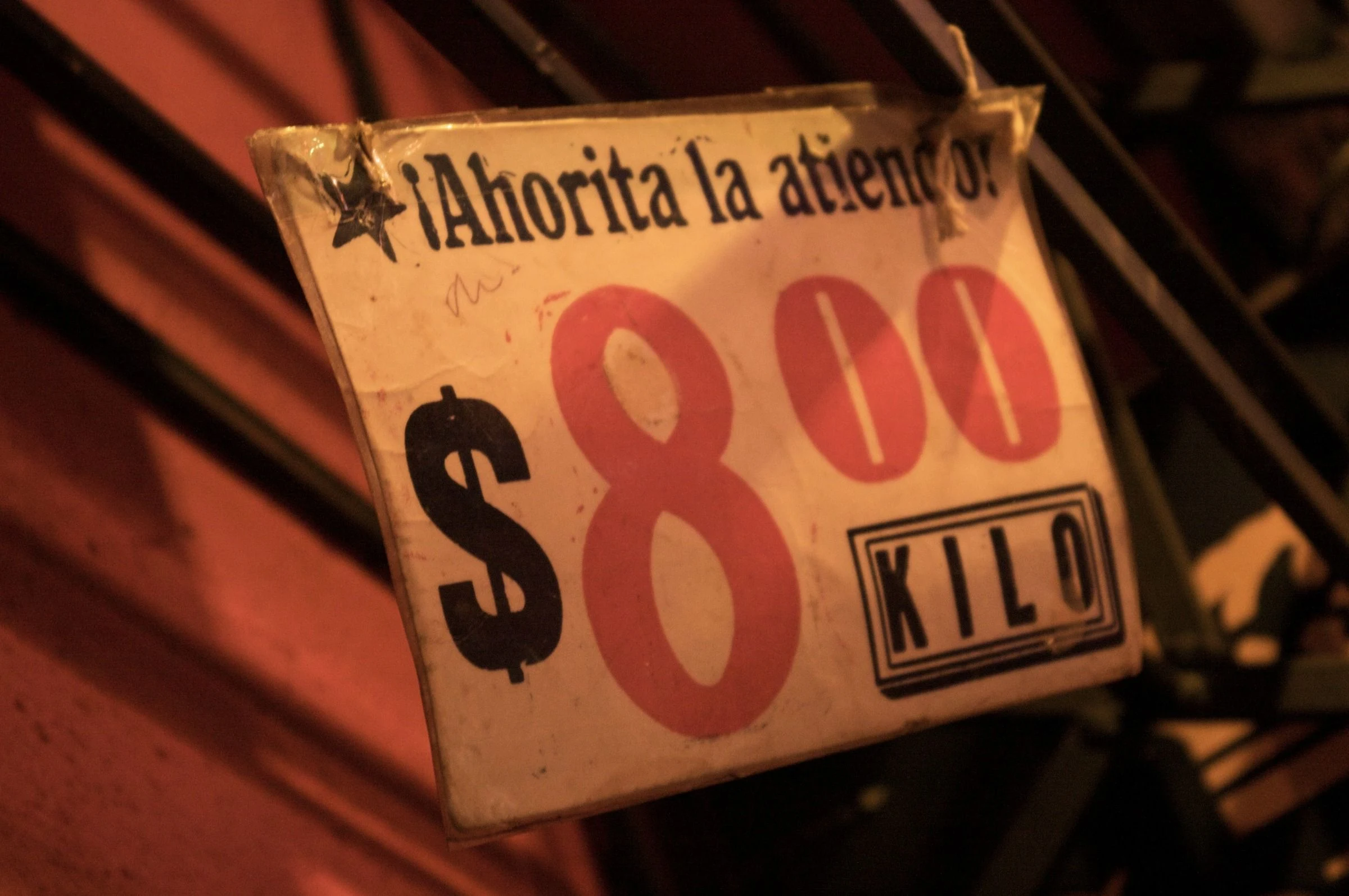 A bright orange price sign