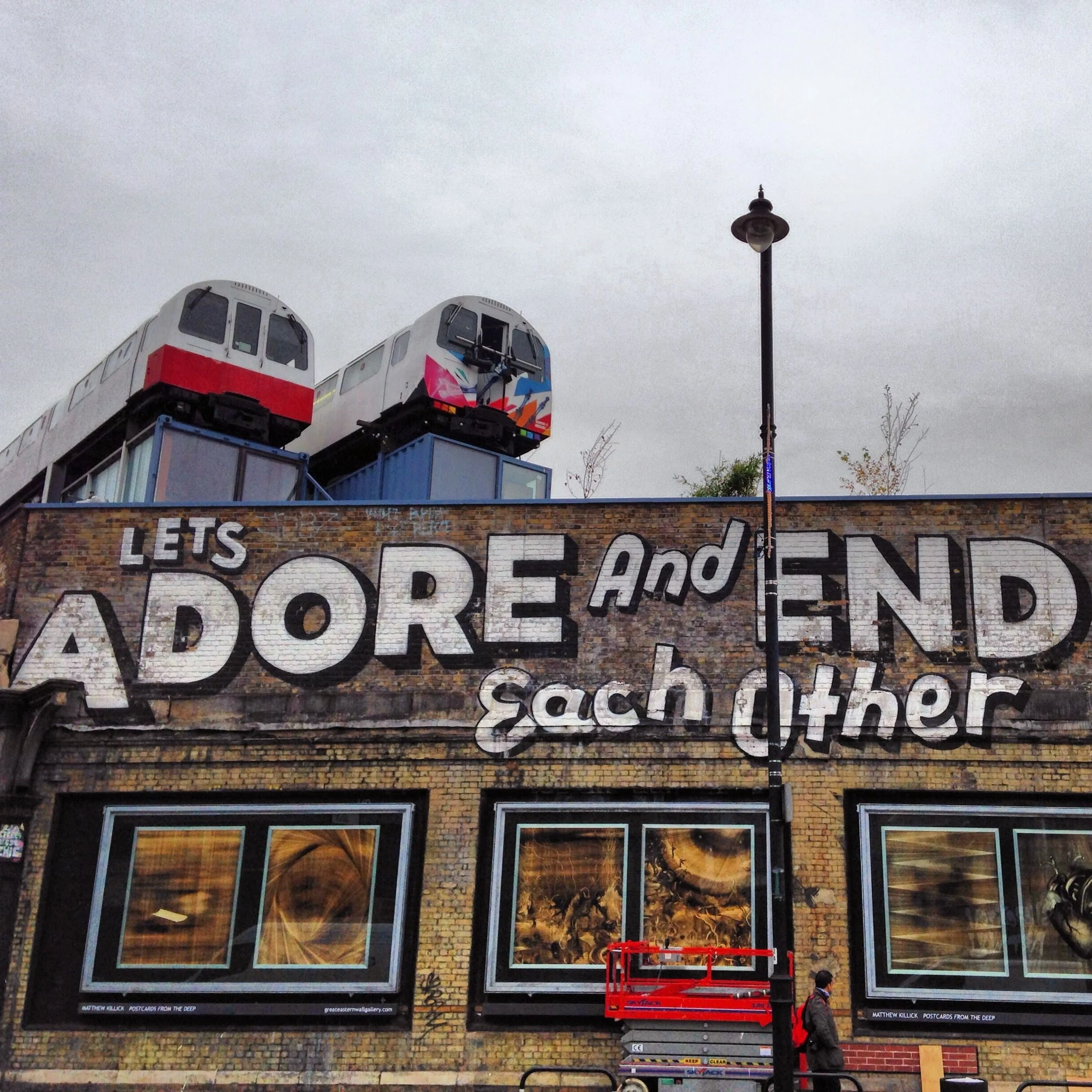 Colorful hand-painted signs outside a shop
