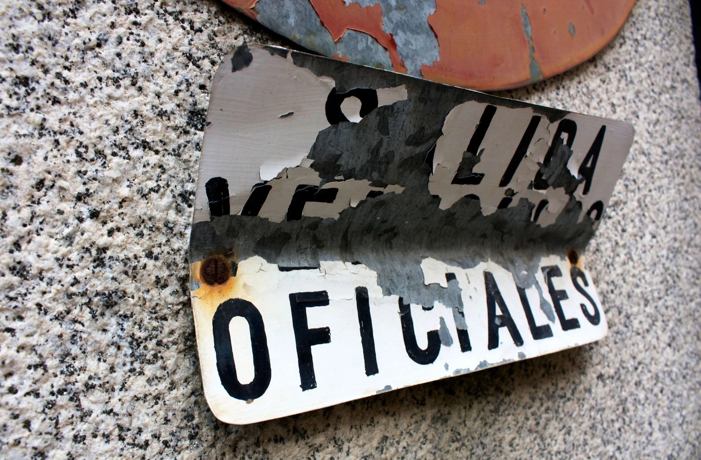 Raised lettering on a textured wall