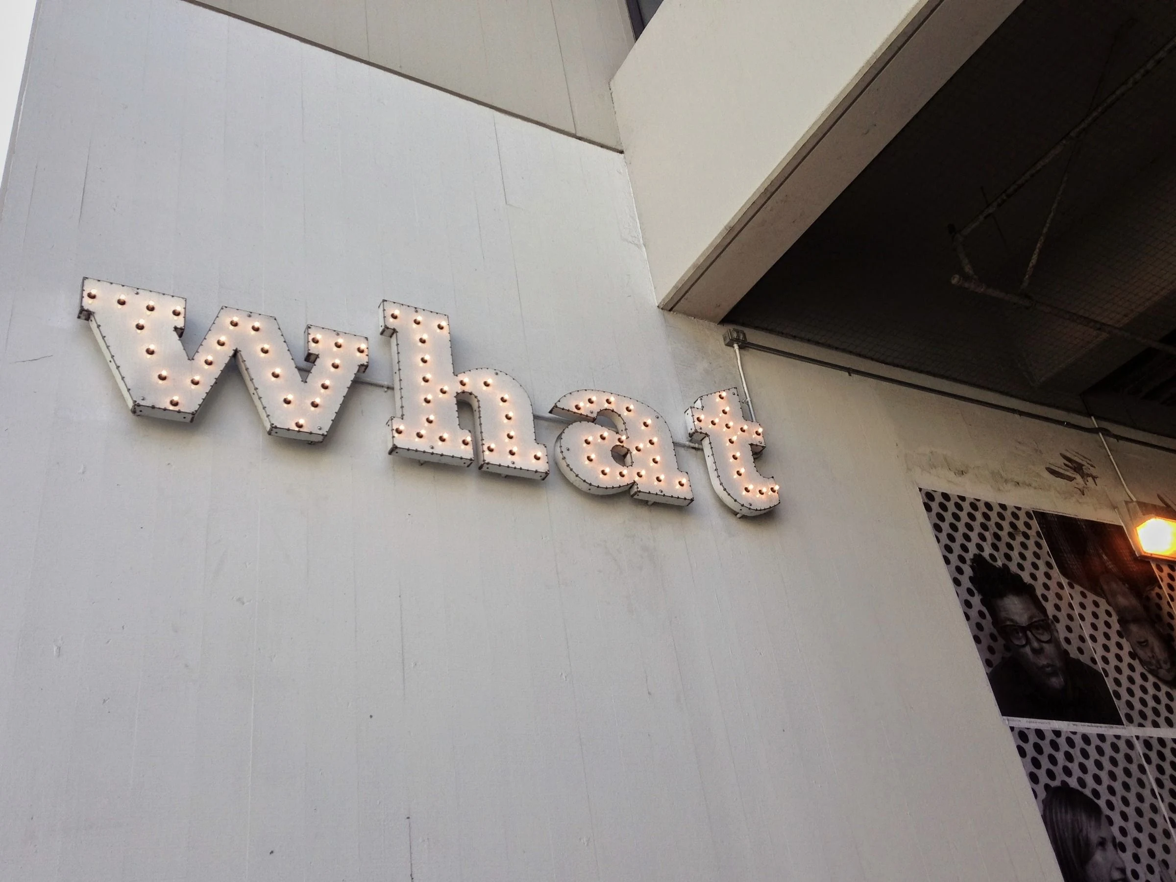 Raised pale letters on a wall