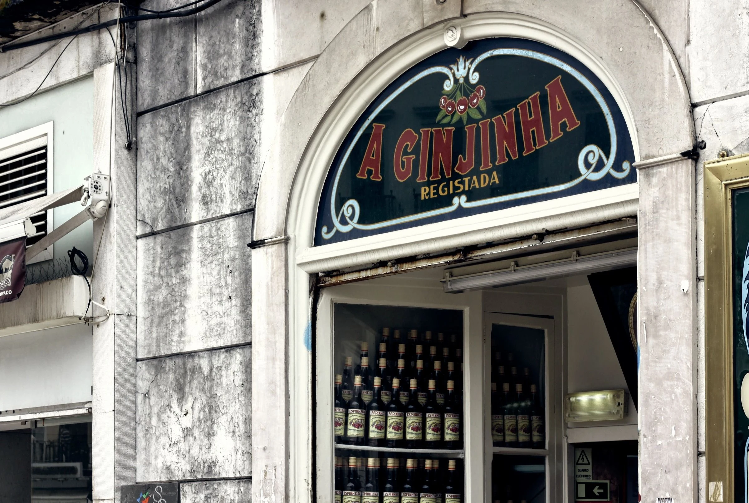 Lettering above an arched entrance